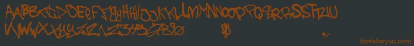 TheBattleContinuez-fontti – ruskeat fontit mustalla taustalla