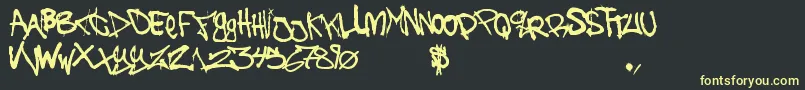 フォントTheBattleContinuez – 黒い背景に黄色の文字