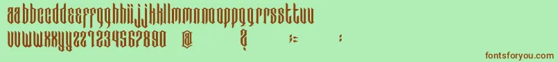 BadBoys-Schriftart – Braune Schriften auf grünem Hintergrund