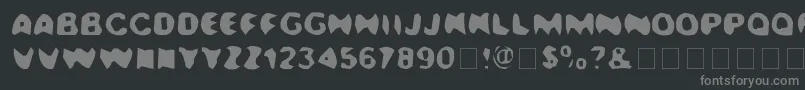 Kalamazoo-fontti – harmaat kirjasimet mustalla taustalla