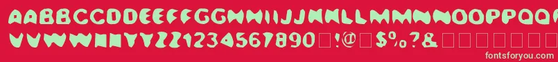Kalamazoo Font – Green Fonts on Red Background