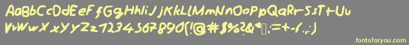 Schreibii Font – Yellow Fonts on Gray Background