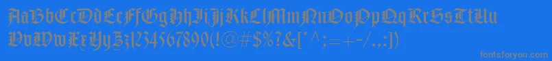 NotreDameLtRoman-Schriftart – Graue Schriften auf blauem Hintergrund