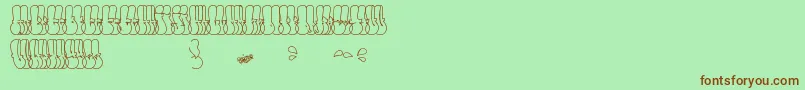 ThrowUpFont Font – Brown Fonts on Green Background