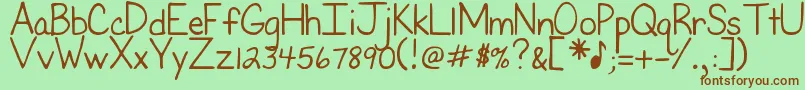 DjbFirstGradeTeacher Font – Brown Fonts on Green Background