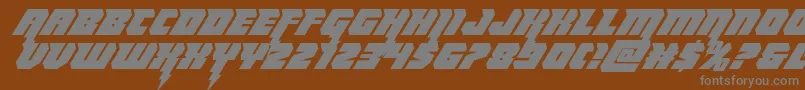 Thundertitanital-fontti – harmaat kirjasimet ruskealla taustalla