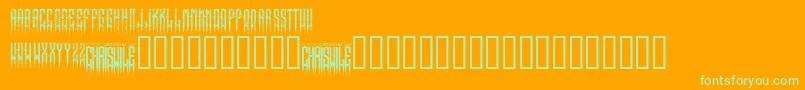 フォントXspikedRegular – オレンジの背景に緑のフォント