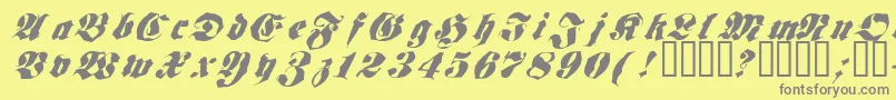 Frakt ffy-fontti – harmaat kirjasimet keltaisella taustalla
