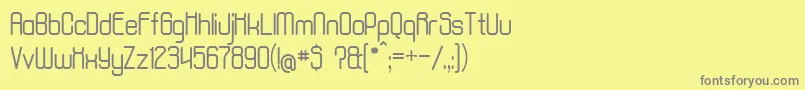 AposiopesisNormal-Schriftart – Graue Schriften auf gelbem Hintergrund