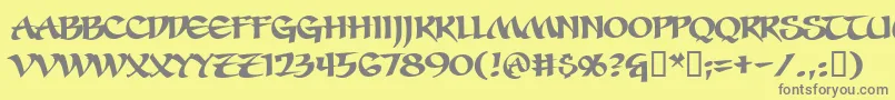 フォントSevesbrg – 黄色の背景に灰色の文字