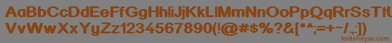 KickAssinger Font – Brown Fonts on Gray Background