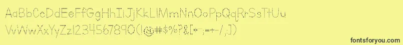 LettersForLearnersDotsHattedJ-fontti – mustat fontit keltaisella taustalla