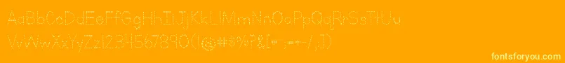 LettersForLearnersDotsHattedJ-fontti – keltaiset fontit oranssilla taustalla