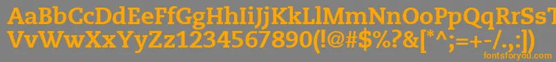 フォントMonologueBlackSsiBlack – オレンジの文字は灰色の背景にあります。