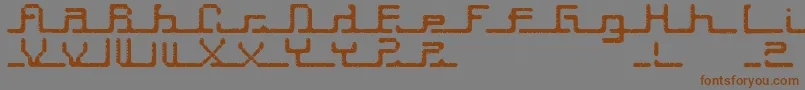 Fonte Transcript ffy – fontes marrons em um fundo cinza