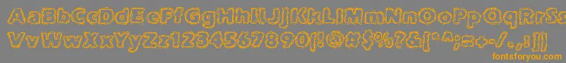 JoltOfCaffeineBrk Font – Orange Fonts on Gray Background