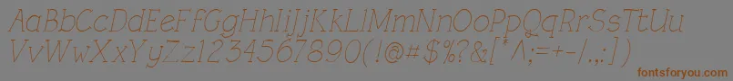 フォントRoughLtLightItalic – 茶色の文字が灰色の背景にあります。