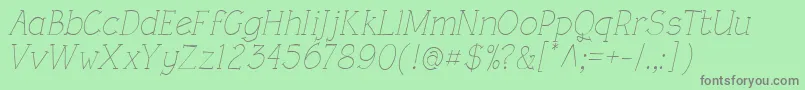 Fonte RoughLtLightItalic – fontes cinzas em um fundo verde