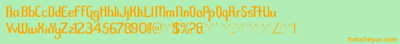 フォントDuel – オレンジの文字が緑の背景にあります。