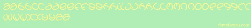 フォントGraphicdream – 黄色の文字が緑の背景にあります