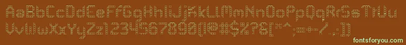 PfMechanicaBProOutline-Schriftart – Grüne Schriften auf braunem Hintergrund