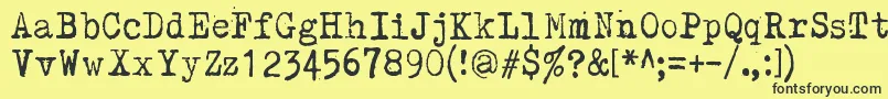 Kirjainkone Font – Black Fonts on Yellow Background