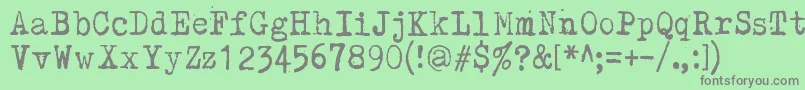 Kirjainkone Font – Gray Fonts on Green Background