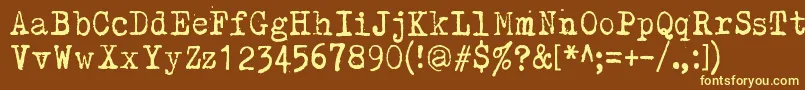 Kirjainkone Font – Yellow Fonts on Brown Background