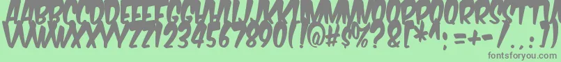 KomikaBoogie Font – Gray Fonts on Green Background