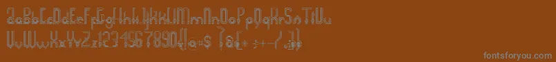 Więcej informacji o czcionce Connexion Czcionka Connexion – szare czcionki na brązowym tle