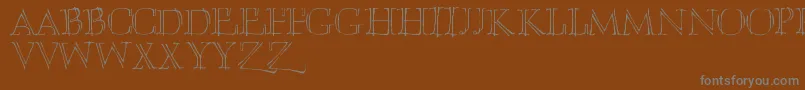 Umberette-Schriftart – Graue Schriften auf braunem Hintergrund