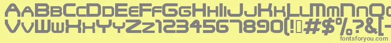 フォントSnfu – 黄色の背景に灰色の文字