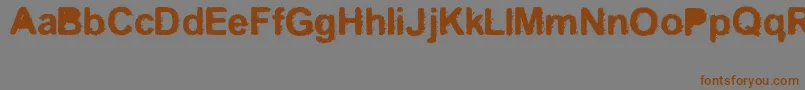 Kreo Font – Brown Fonts on Gray Background