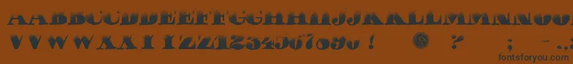 PuchaDawn-fontti – mustat fontit ruskealla taustalla