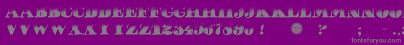 PuchaDawn-fontti – harmaat kirjasimet violetilla taustalla