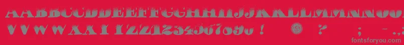 PuchaDawn-fontti – harmaat kirjasimet punaisella taustalla