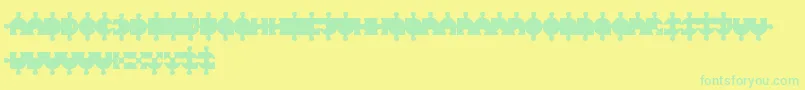 PuzzleFont-Schriftart – Grüne Schriften auf gelbem Hintergrund