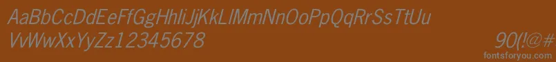 Saiba mais sobre a fonte NewsGothicItalic Fonte NewsGothicItalic – fontes cinzas em um fundo marrom