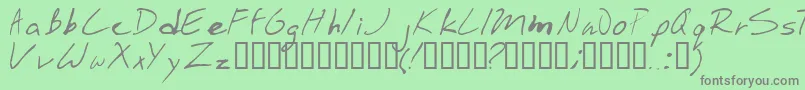 フォントStinkbomb – 緑の背景に灰色の文字