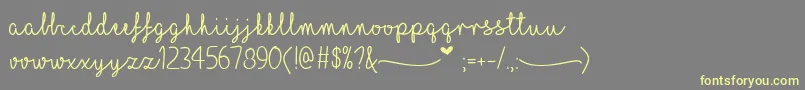 MfILoveGlitter Font – Yellow Fonts on Gray Background