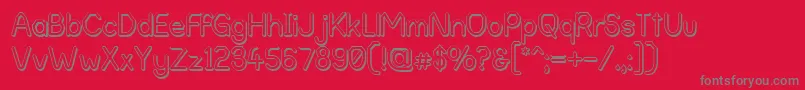 fuente AlphaRomanieOutlineG98 – Fuentes Grises Sobre Fondo Rojo