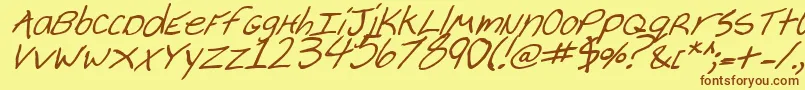 フォントCheyennebi – 茶色の文字が黄色の背景にあります。