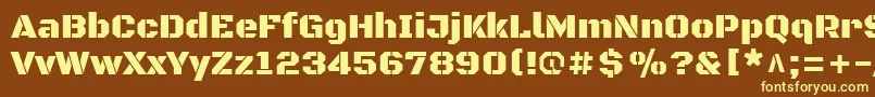BlackopsoneRegular-fontti – keltaiset fontit ruskealla taustalla
