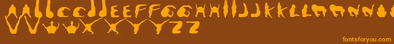 Muttopia Font – Orange Fonts on Brown Background