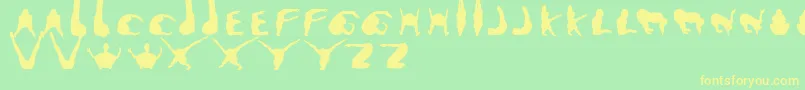 Muttopia Font – Yellow Fonts on Green Background