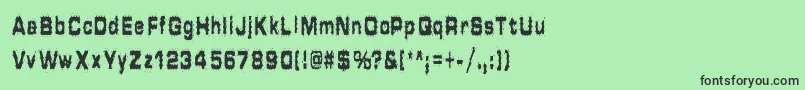 フォントHammeredType – 緑の背景に黒い文字