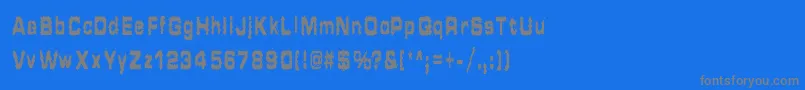 フォントHammeredType – 青い背景に灰色の文字