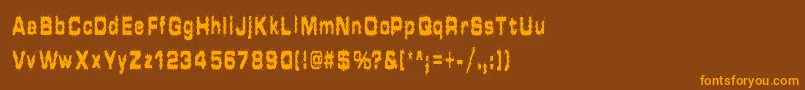 フォントHammeredType – オレンジ色の文字が茶色の背景にあります。