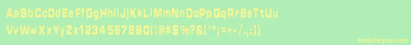 フォントHammeredType – 黄色の文字が緑の背景にあります