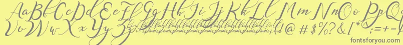 NazeefaDemo-fontti – harmaat kirjasimet keltaisella taustalla